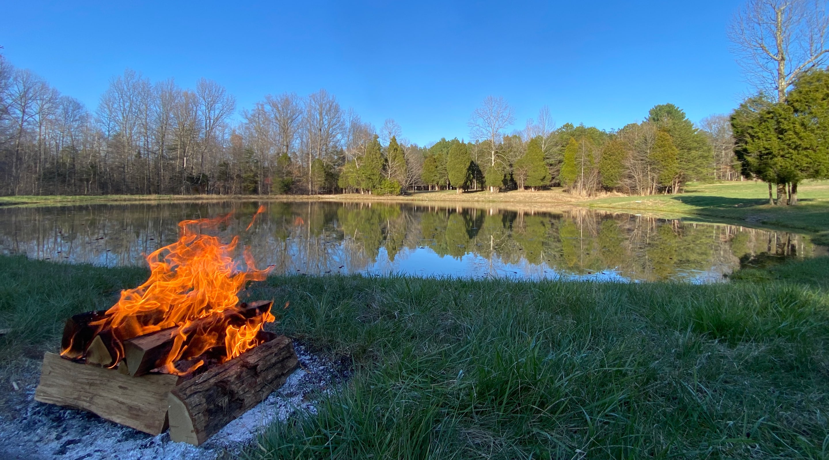 Lake and Campfire at Nighthawk Forest Campground
